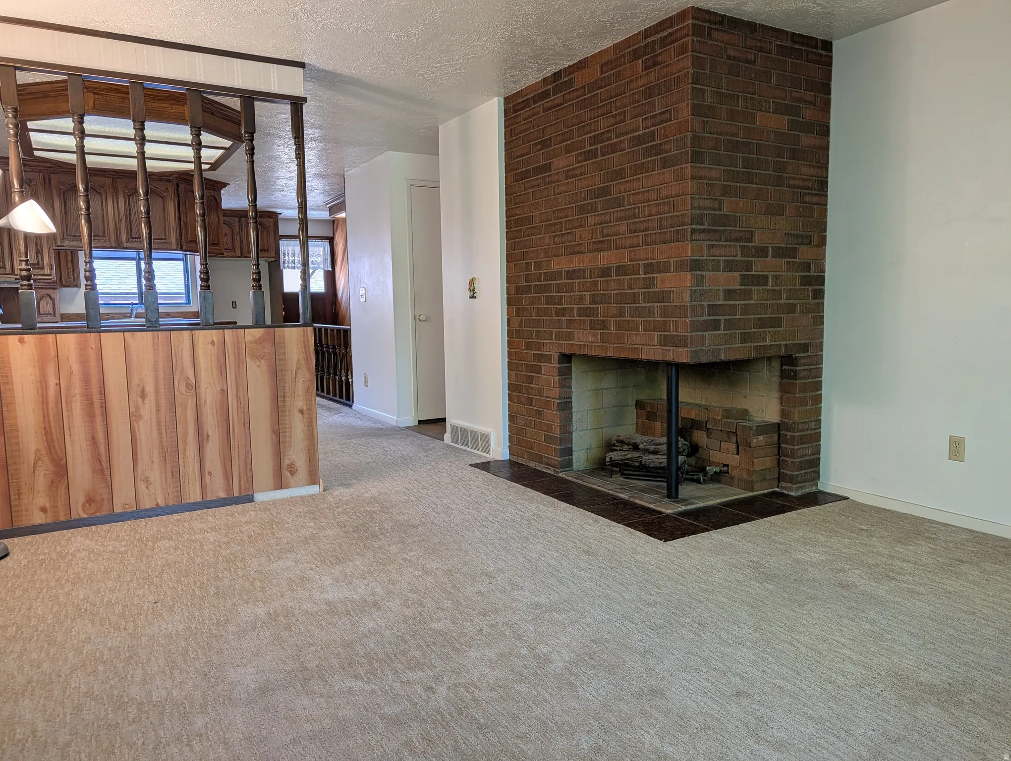 Brick fireplace with an integrated hearth
