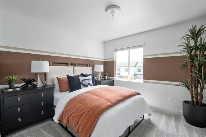 Bedroom with carpet and a textured ceiling
