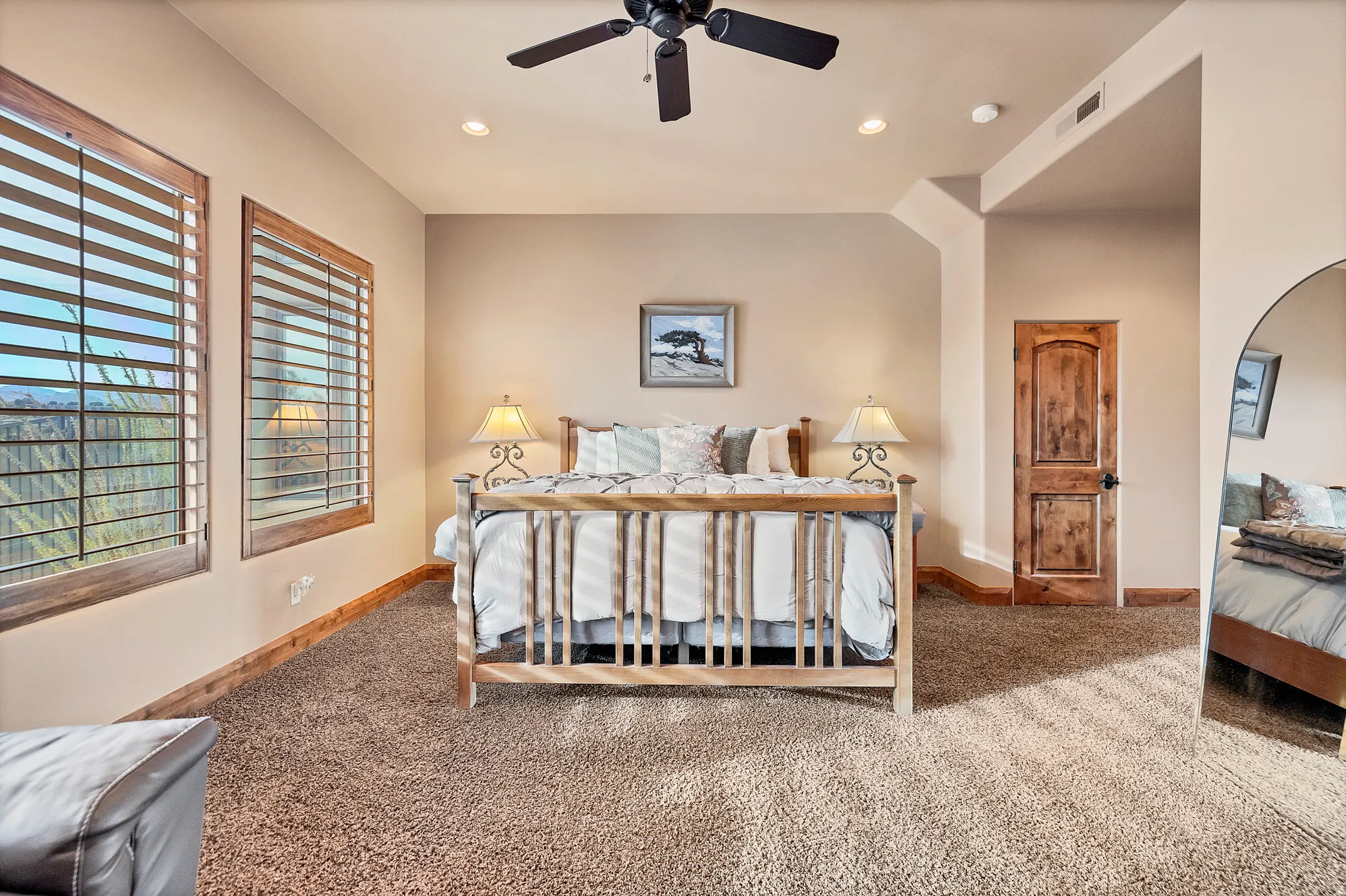 Bedroom featuring carpet floors, ceiling fan, and recessed lighting