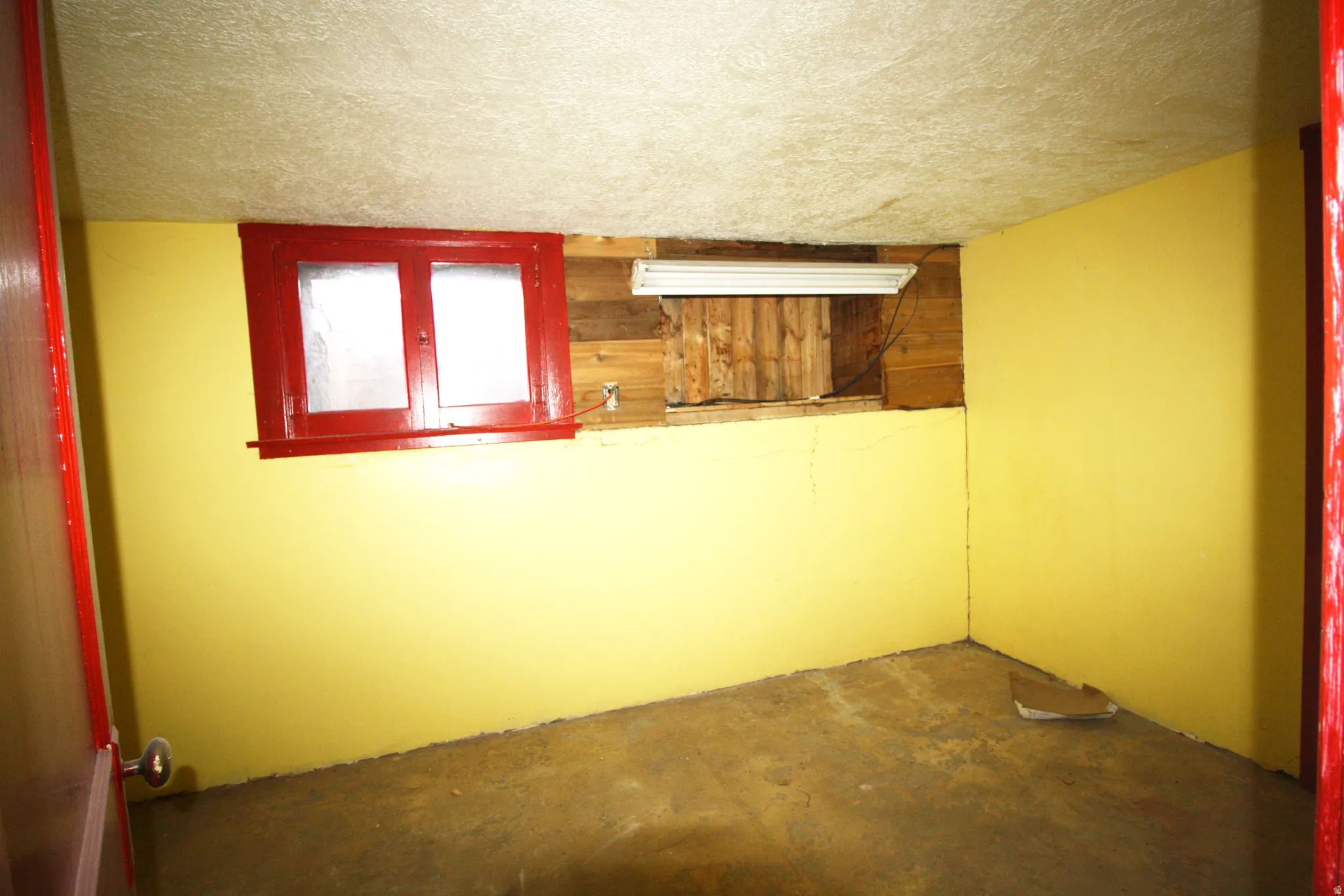 Basement Bedroom 4 featuring a textured ceiling