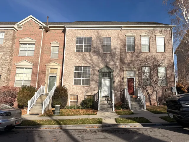 View of front of home with brick siding