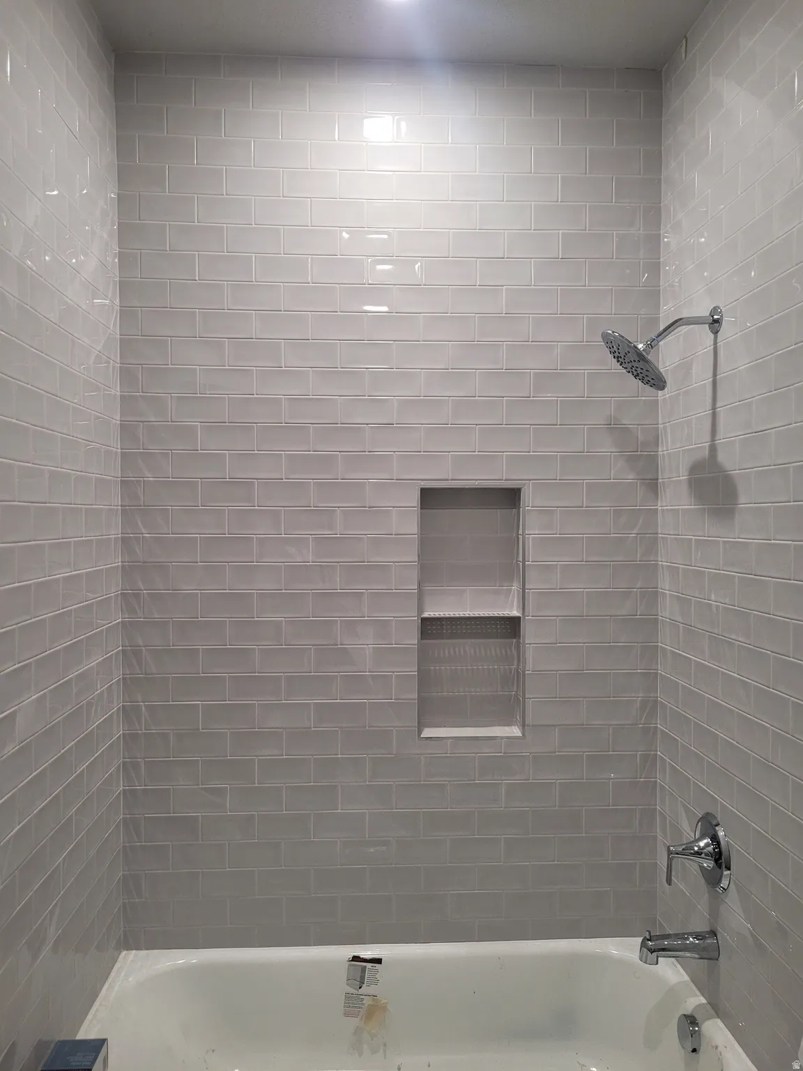 Bathroom with shower / bath combination