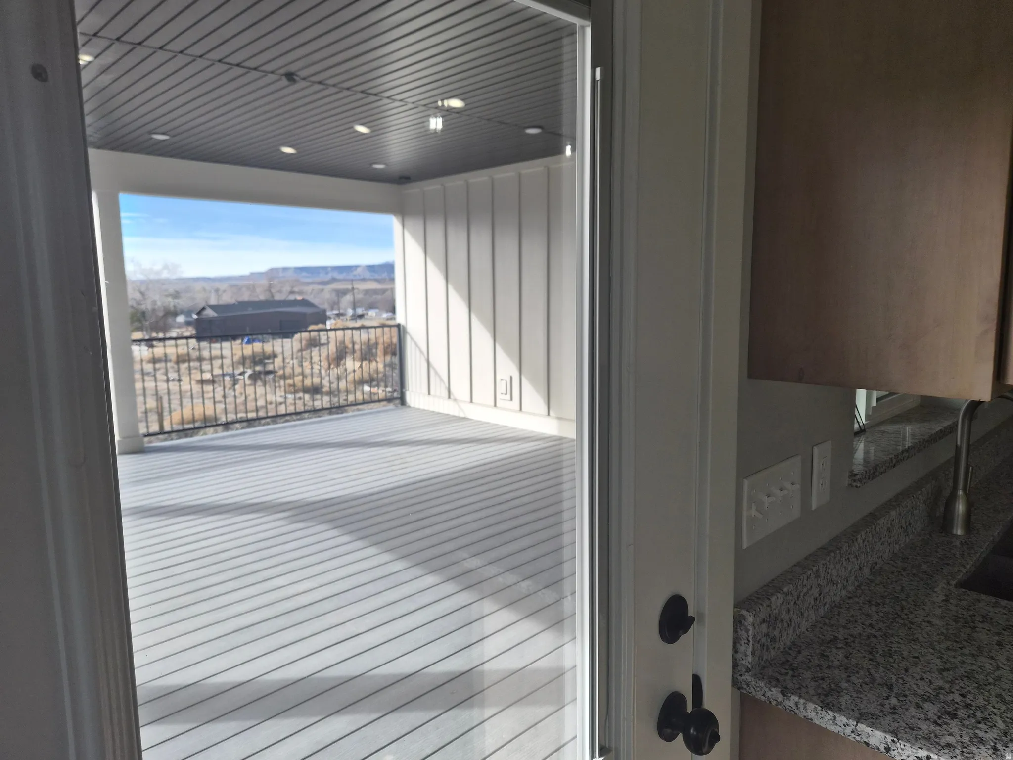 Deck featuring a sink and a mountain view