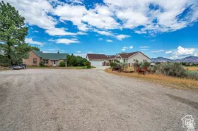 Single story home featuring driveway