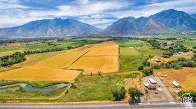 Aerial view of sparsely populated area with a mountainous background