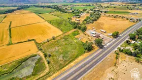 Aerial view of sparsely populated area featuring extensive farmland