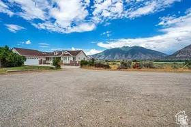 View of front of house with a mountain view