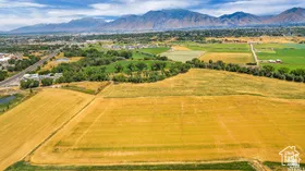 Overview of rural landscape with mountains and extensive farmland