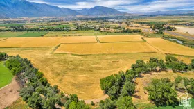 Overview of rural landscape with a mountain backdrop