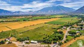 Overview of rural landscape with a mountainous background