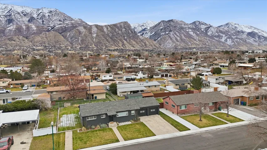 View of mountain background featuring nearby suburban area