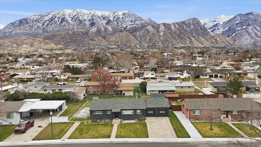 View of mountain backdrop with nearby suburban area