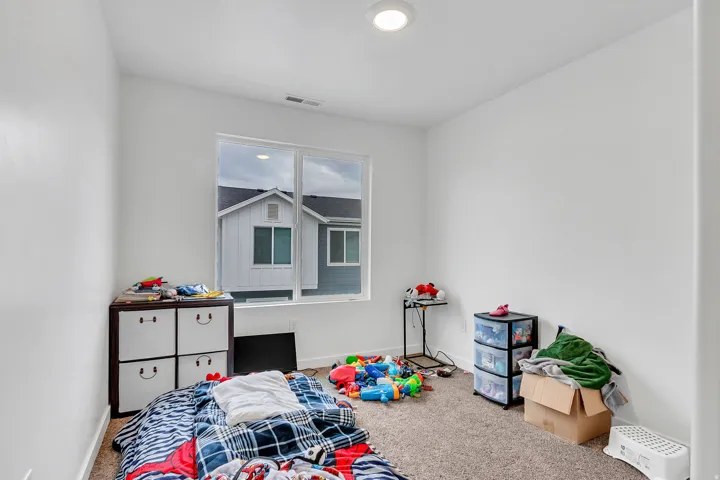 Playroom with carpet and baseboards