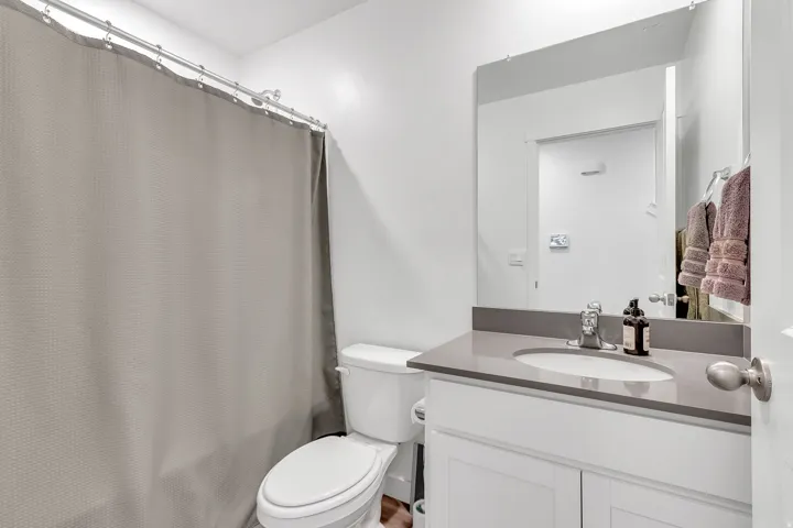 Full bath with vanity and toilet