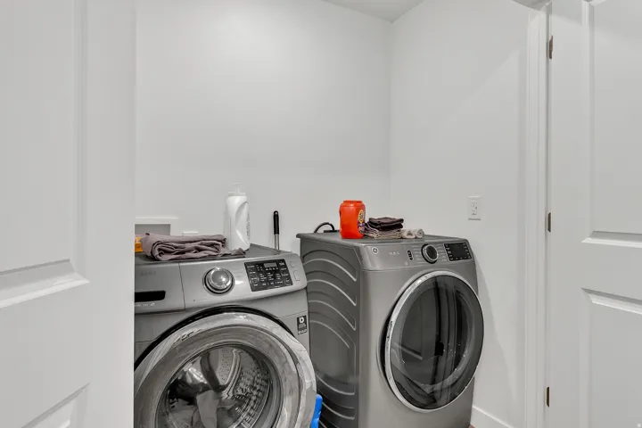 Laundry room with separate washer and dryer