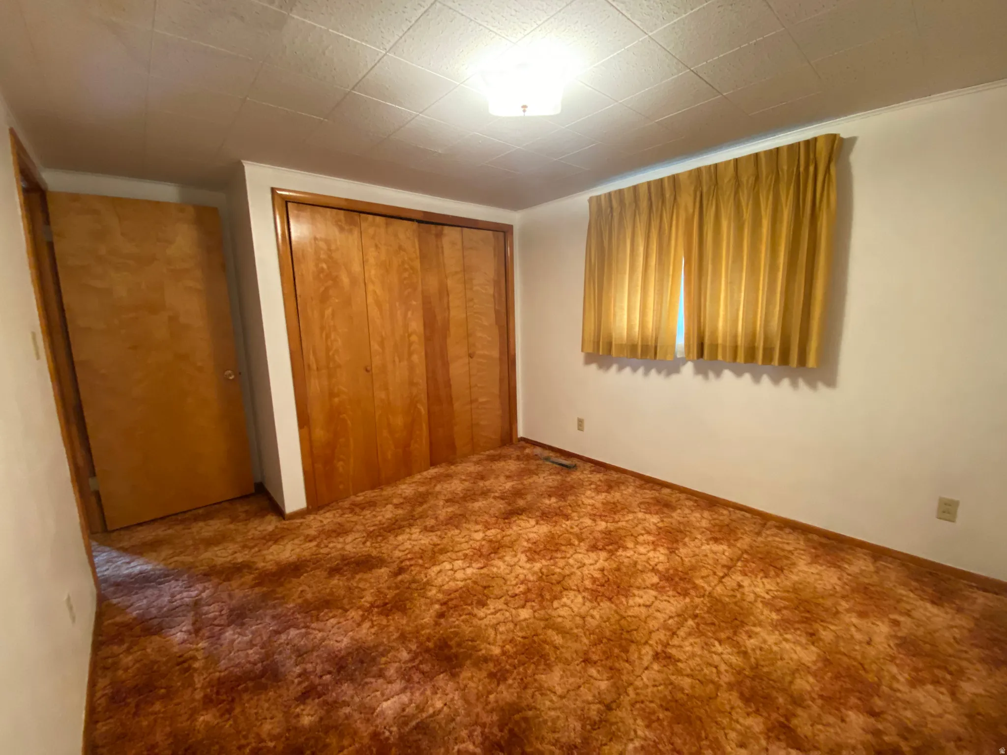 Bedroom #1 featuring a closet and carpet floors