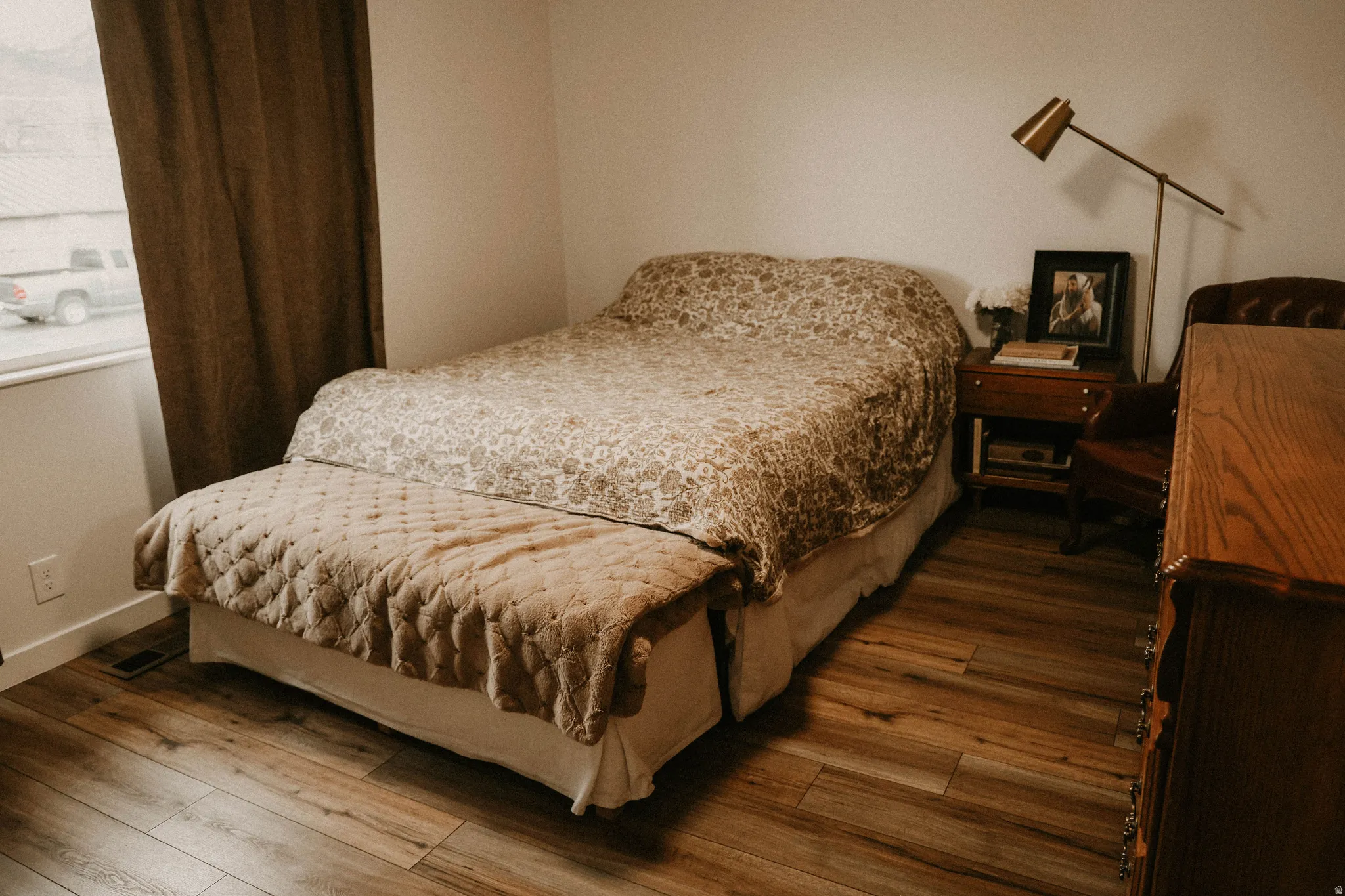 Bedroom featuring hardwood / wood-style flooring