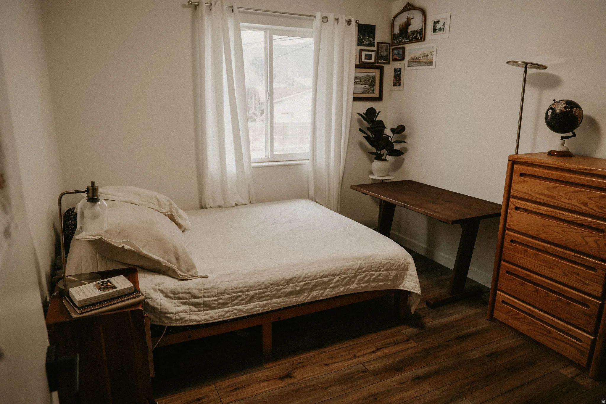 Bedroom featuring dark wood-type flooring