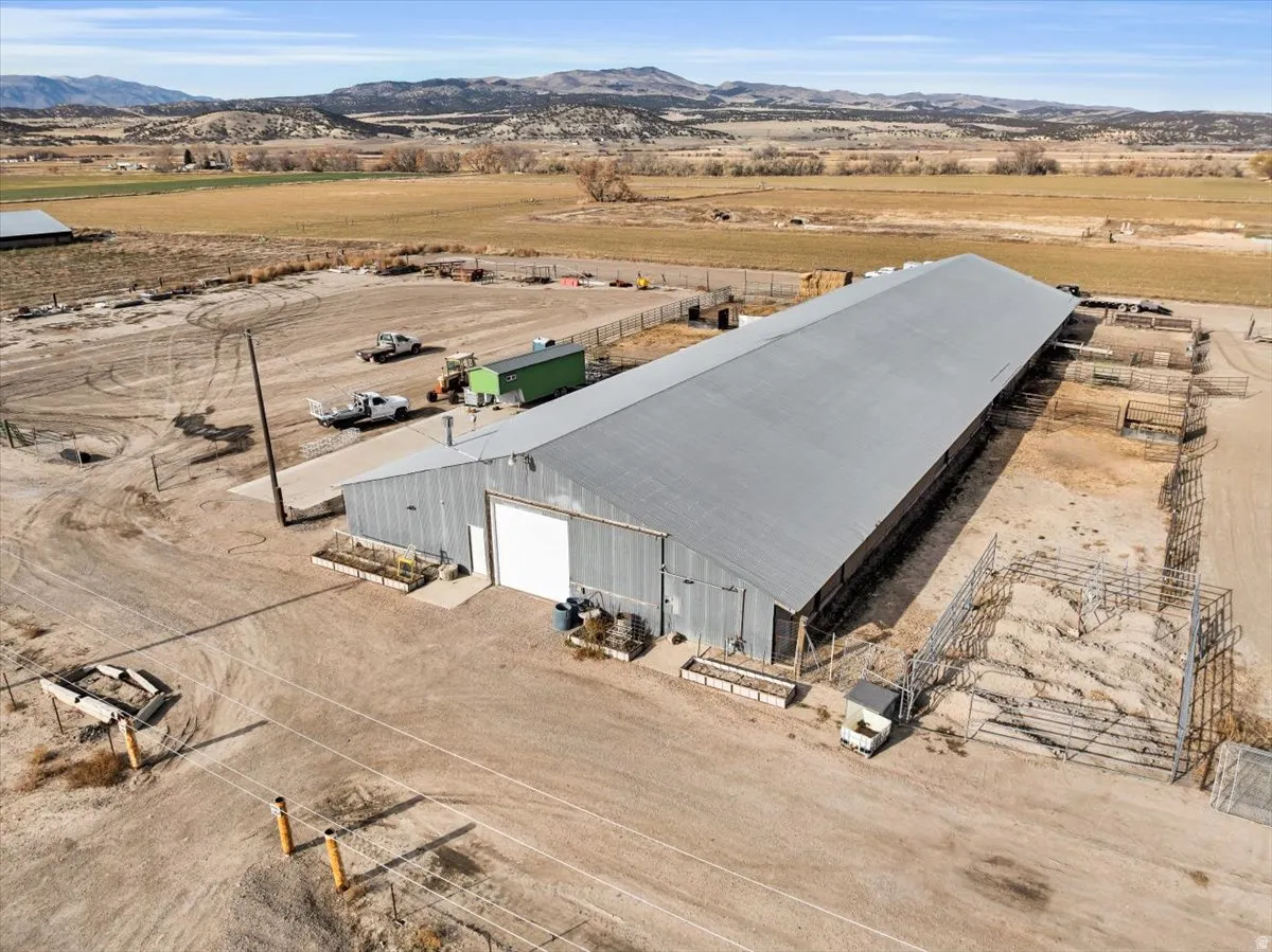 Aerial view of sparsely populated area with a mountain backdrop