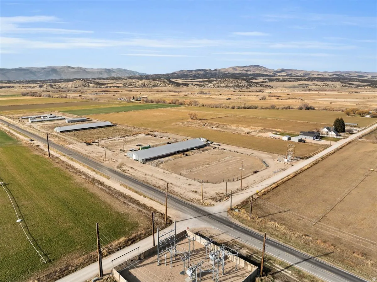 Aerial view of sparsely populated area featuring a mountainous background