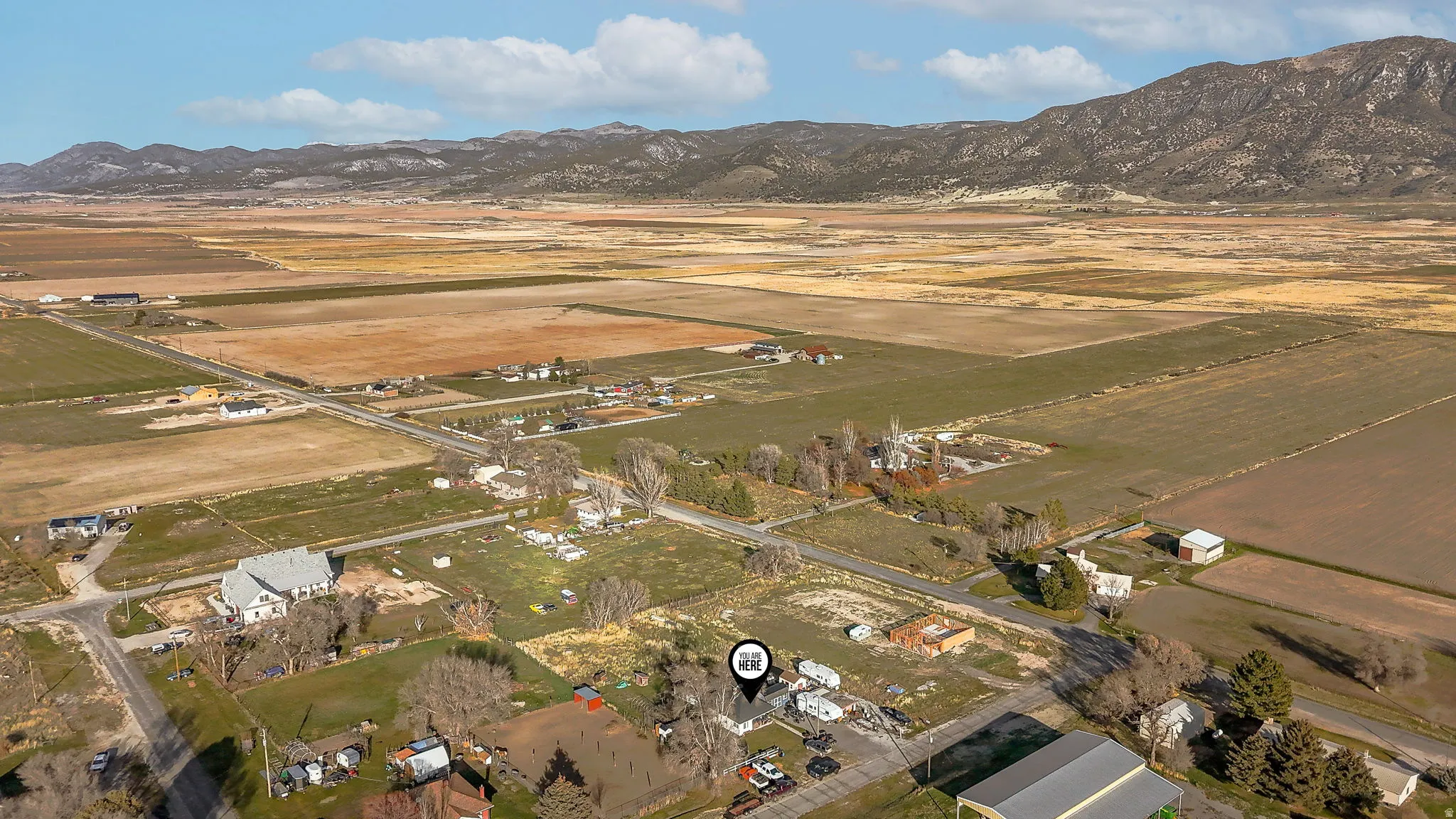 View of property location featuring mountains and rural landscape