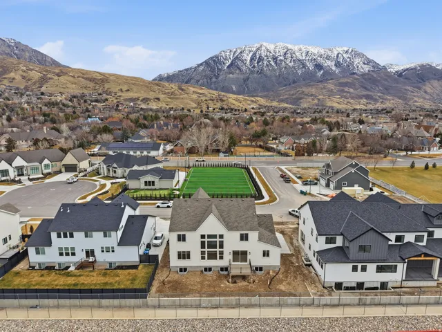 Aerial perspective of suburban area with mountains