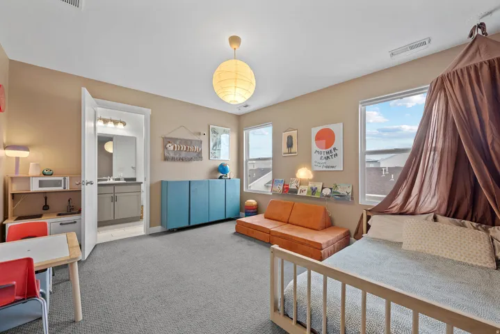 Bedroom with carpet and bathroom