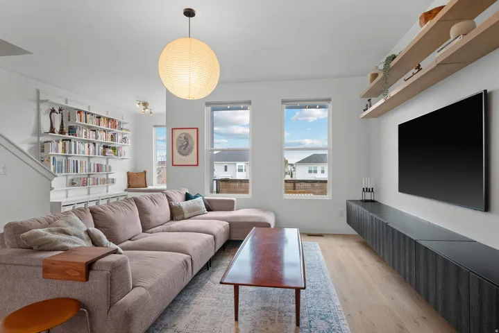 Living area featuring light wood-style floors