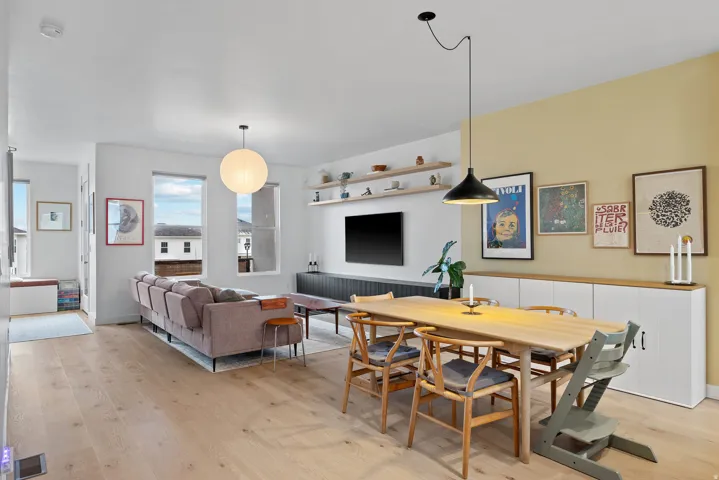Dining area with light wood-type flooring