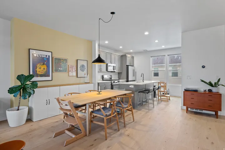 Dining room featuring light wood-style flooring and recessed lighting