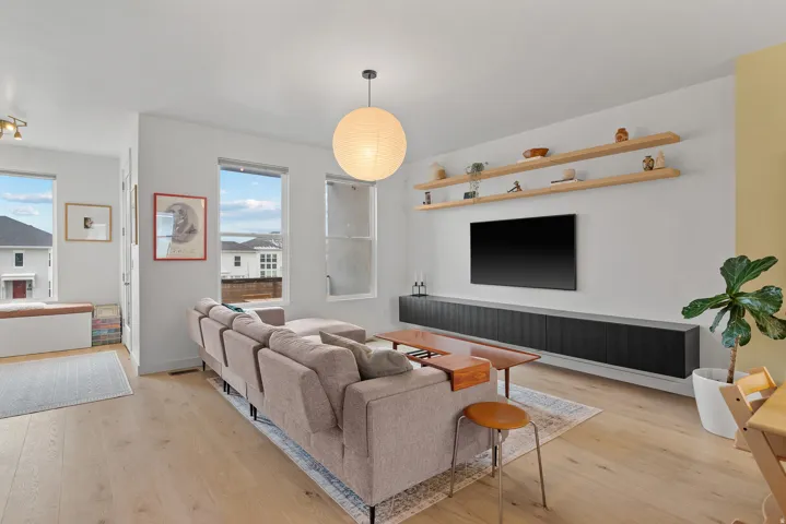 Living area featuring light wood-style flooring