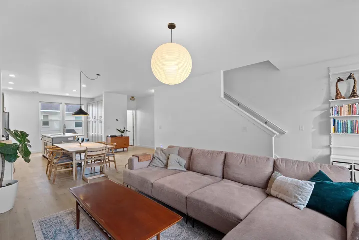 Living room featuring wood finished floors and recessed lighting