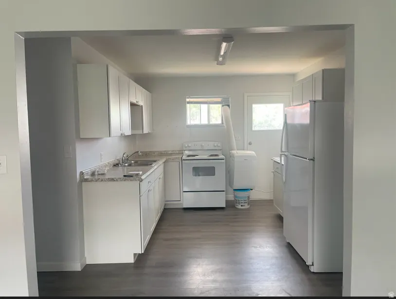 Kitchen with white appliances
