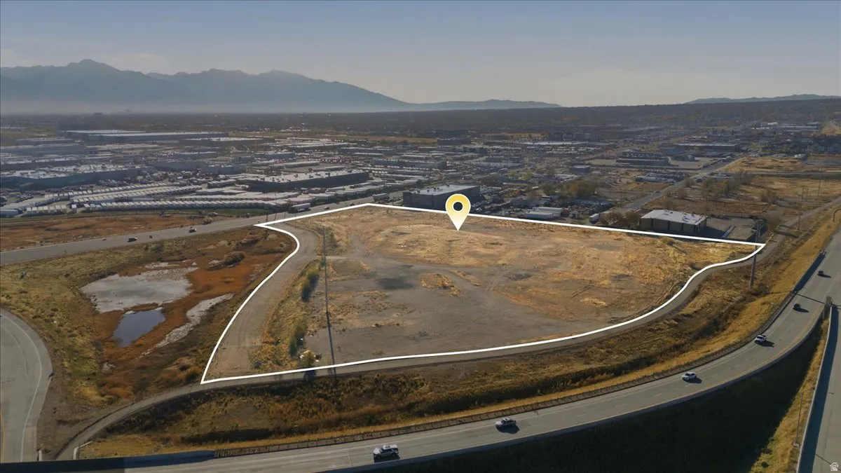 Aerial overview of property's location featuring property parcel outlined