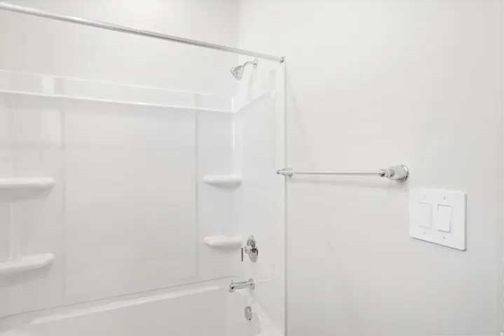 ***DISCLAIMER** Exterior & Interior finishes may vary. Full bathroom featuring washtub / shower combination