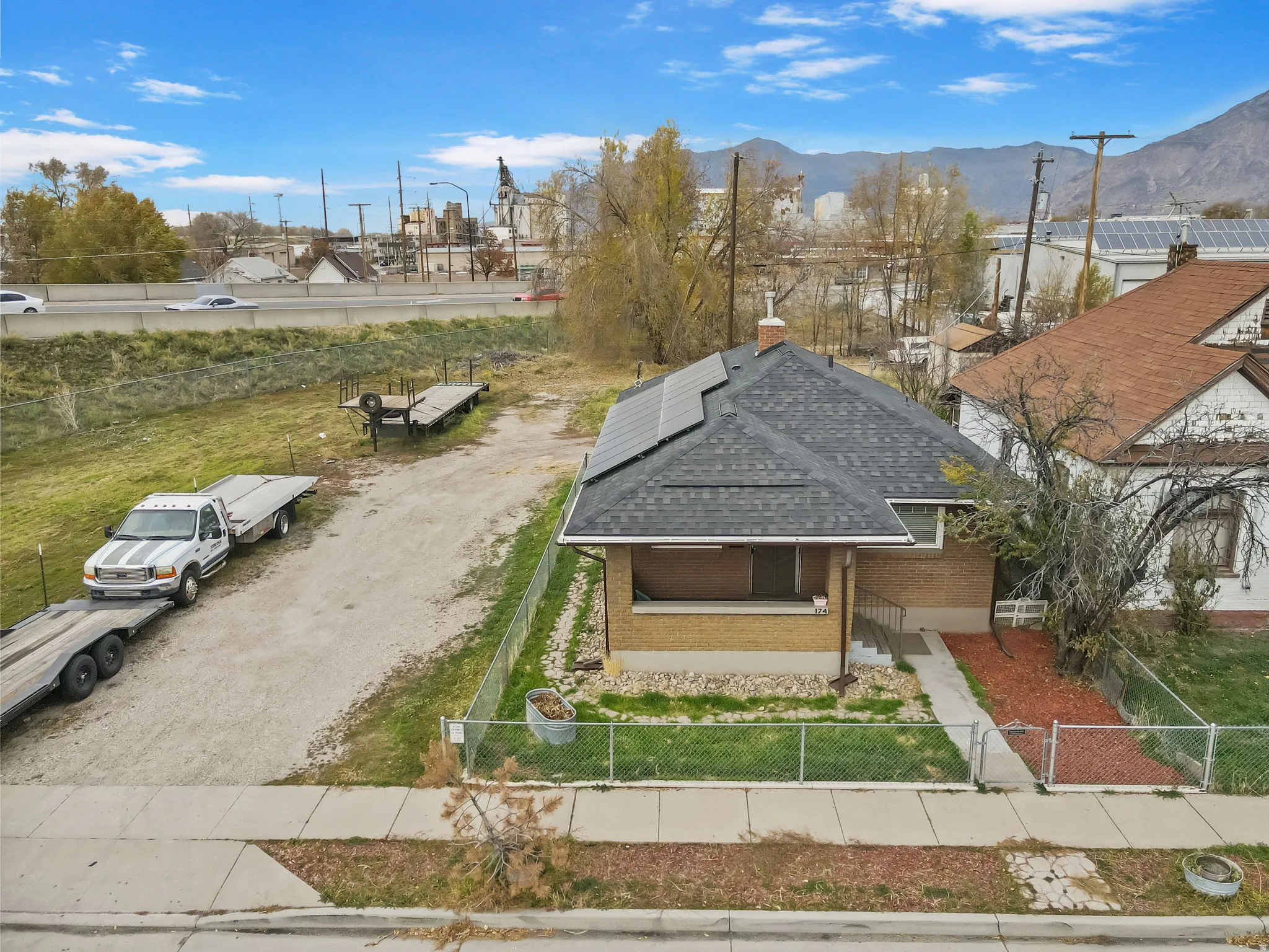 View from above of property featuring a mountainous background