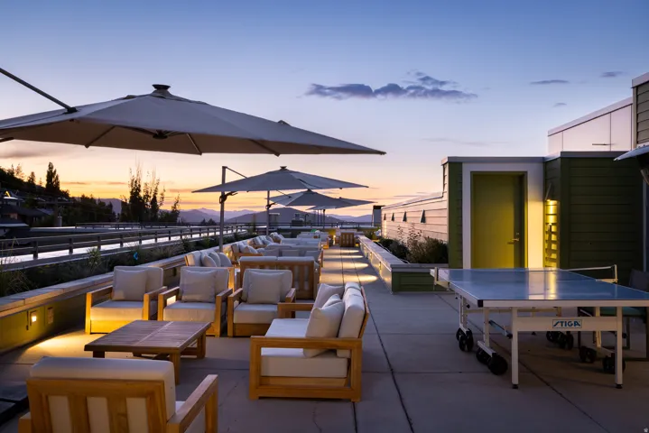 View of patio with an outdoor hangout area