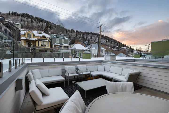 View of patio with an outdoor hangout area and a residential view