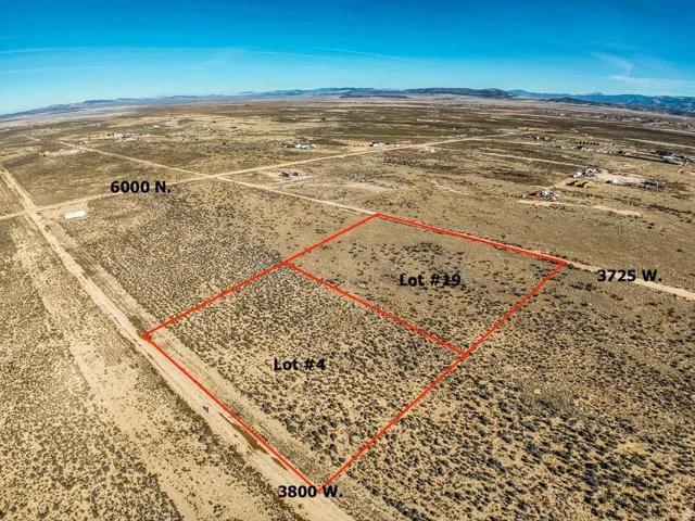 Overview of rural landscape with mountains and property boundaries highlighted