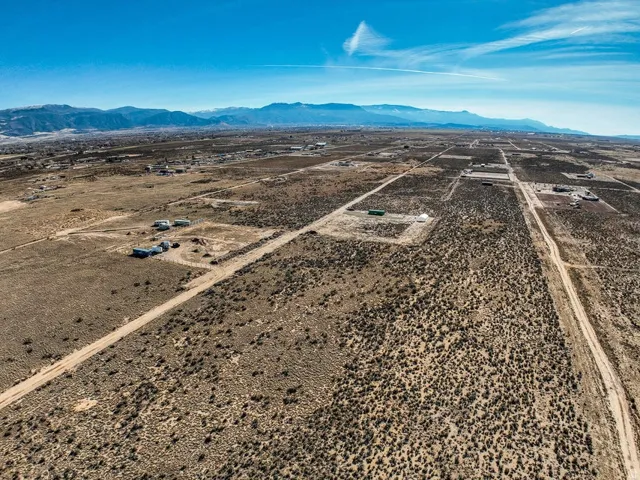 View of rural area featuring a desert landscape and mountains