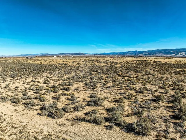 View of mountain backdrop featuring a desert landscape and rural landscape