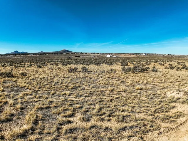 View of mountain backdrop featuring a desert landscape and rural landscape