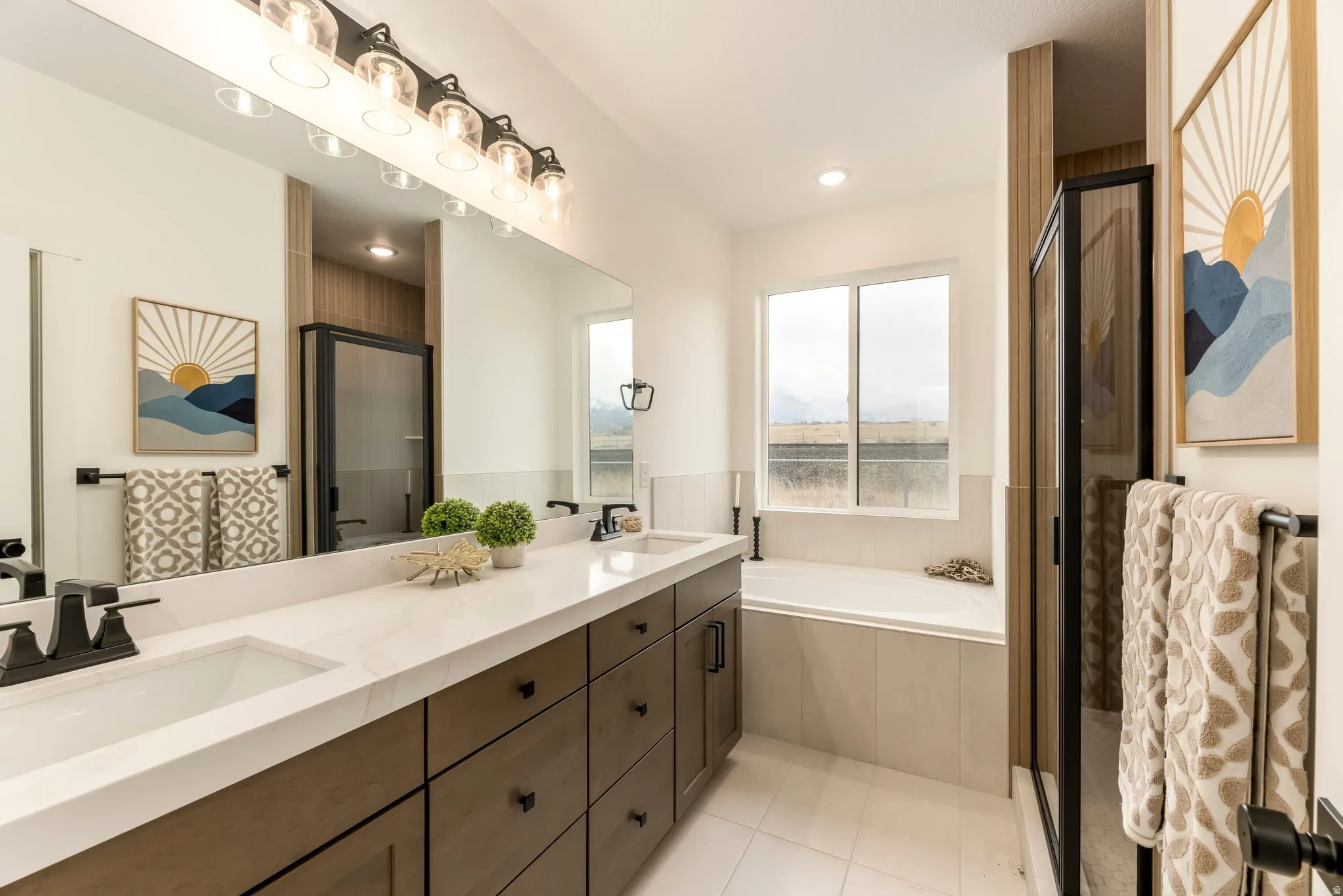 Bathroom with a stall shower, a bath, double vanity, light tile patterned flooring, and recessed lighting