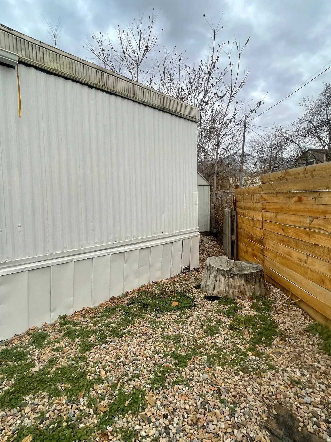 View of home's exterior featuring an outbuilding