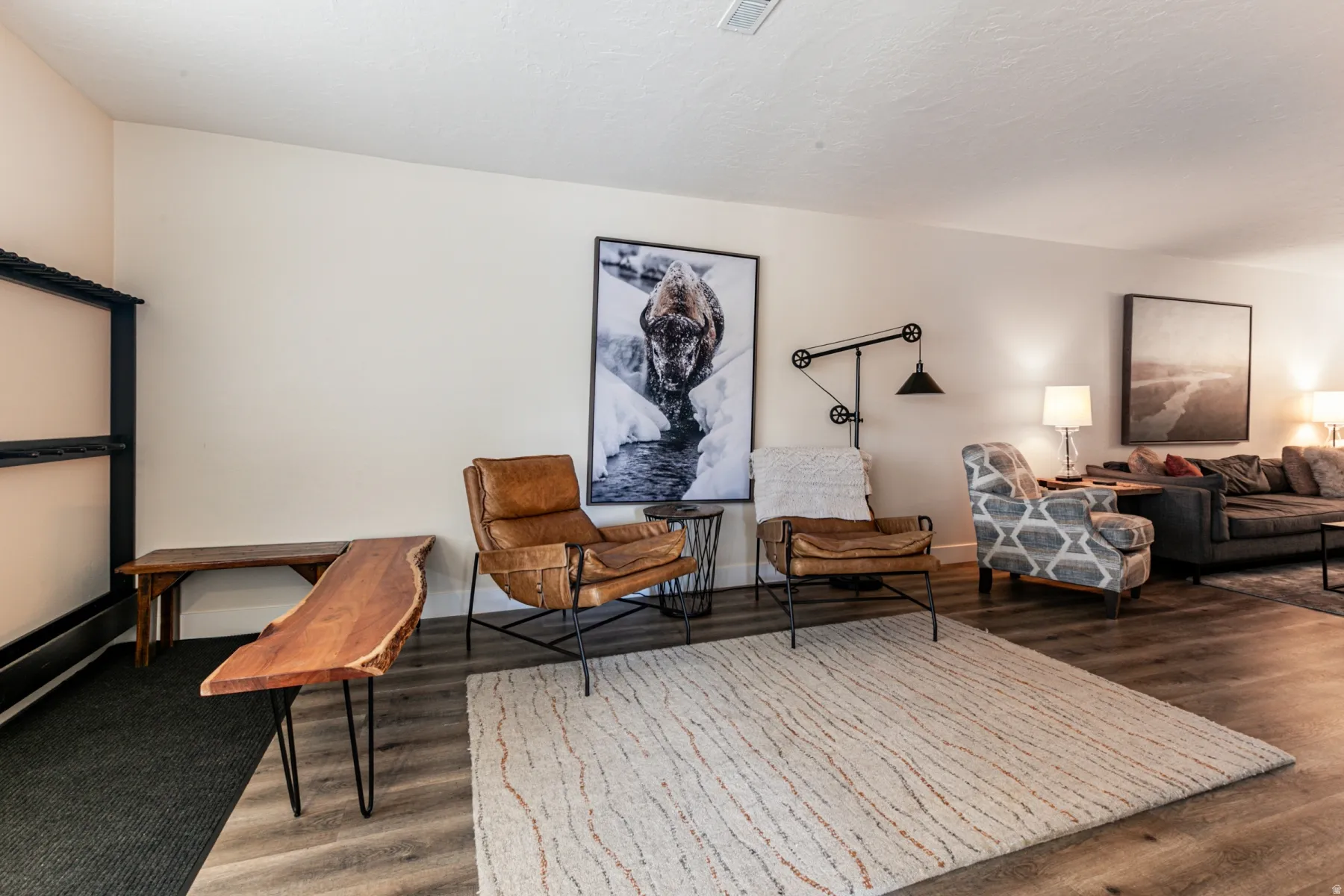 Living area featuring wood finished floors and baseboards