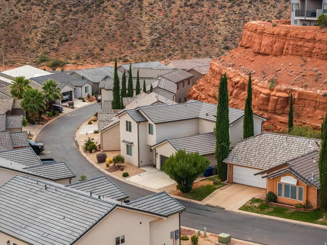 Residential community featuring varied architectural styles and gray tile roofs