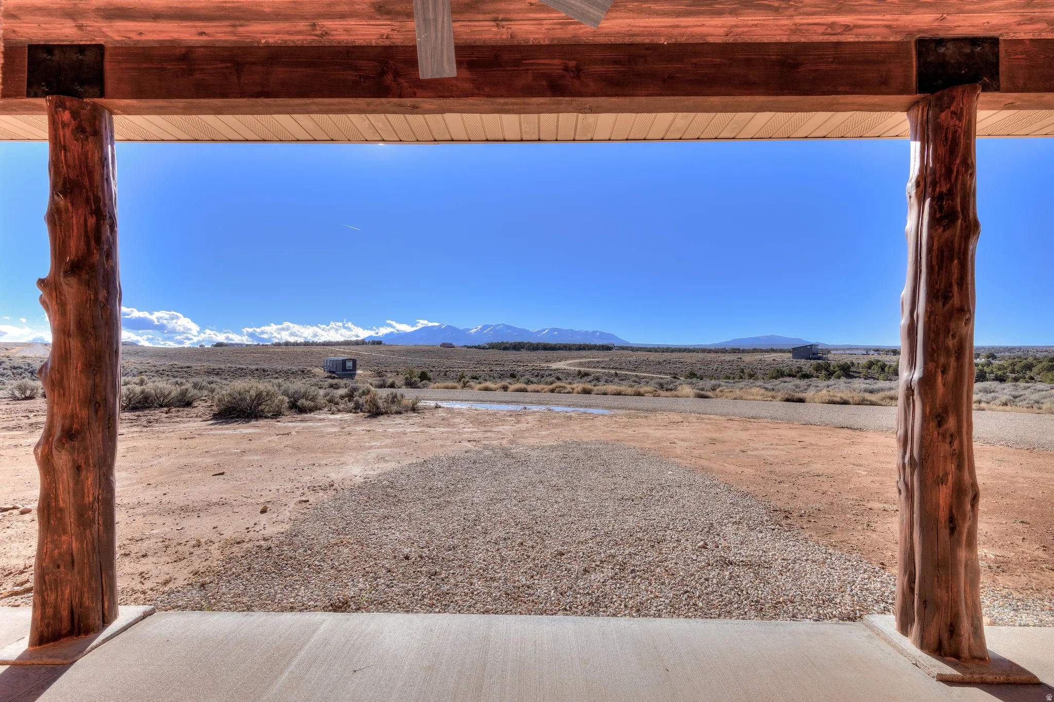 View of yard featuring a mountain view and a view of rural / pastoral area