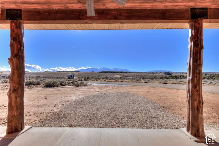 View of yard featuring a mountain view and a view of rural / pastoral area