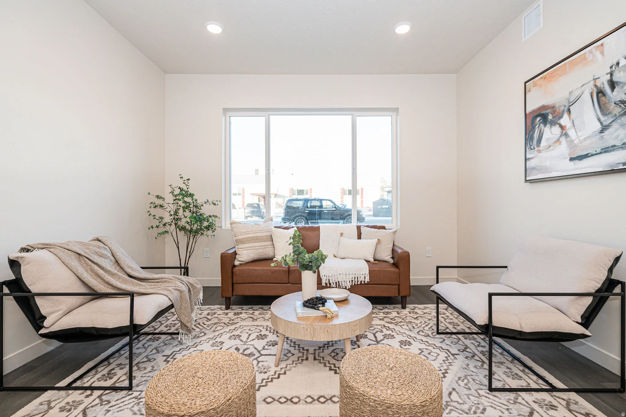 Sitting room featuring wood finished floors and recessed lighting