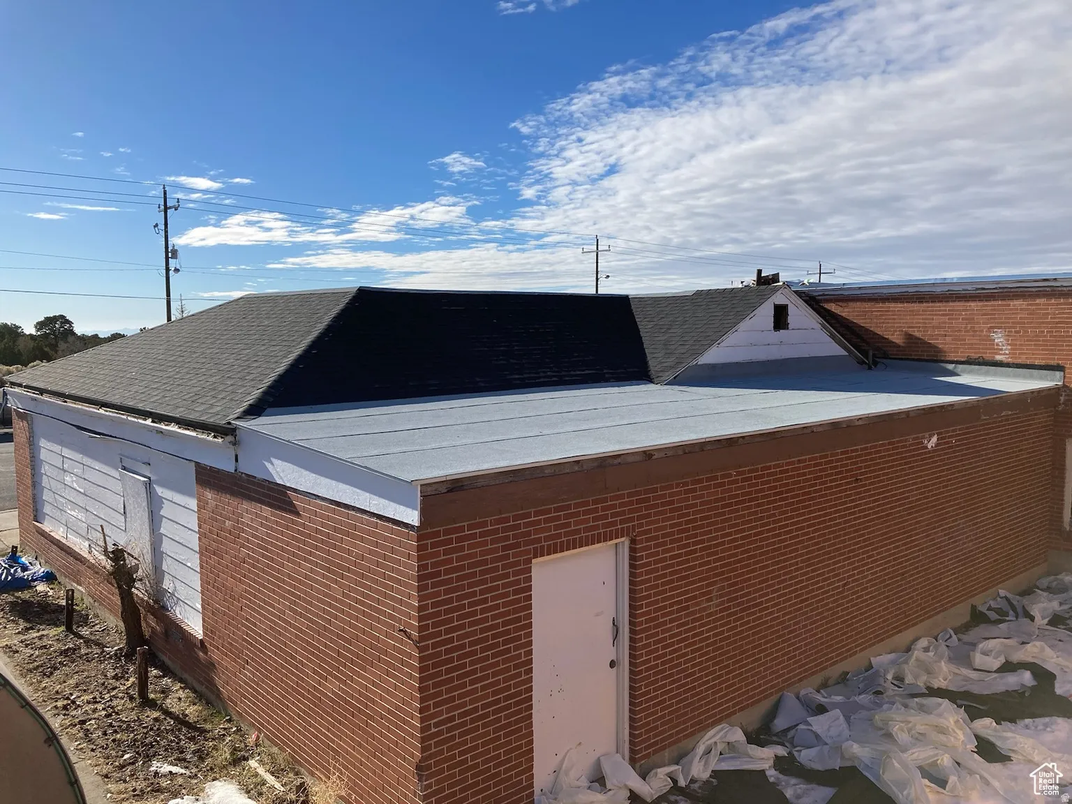 View of home's exterior featuring brick siding